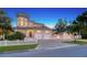 Three-car garage and charming three-story home exterior at 1714 Irving St, Sarasota, FL 34236