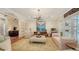 Gathering room featuring large TV, comfortable seating, and access to patio at 1714 Irving St, Sarasota, FL 34236