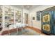 Home office with built-in shelving and hardwood floors at 1714 Irving St, Sarasota, FL 34236