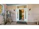 Open front door revealing interior and stained glass window at 1714 Irving St, Sarasota, FL 34236