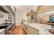 Spacious kitchen boasts marble countertops, high-end appliances, and an island with seating at 1714 Irving St, Sarasota, FL 34236