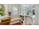 Bright landing features built-in shelving, window seat, and hardwood floors at 1714 Irving St, Sarasota, FL 34236