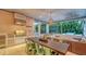 Outdoor kitchen with stainless steel appliances and dining area at 1714 Irving St, Sarasota, FL 34236
