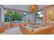 Relaxing outdoor lounge area with wicker furniture and pool view at 1714 Irving St, Sarasota, FL 34236
