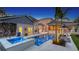 Inviting pool area with spa, lounge chairs, and outdoor lighting at 1714 Irving St, Sarasota, FL 34236