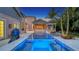 Relaxing pool and spa area with a view of the house at 1714 Irving St, Sarasota, FL 34236