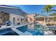 Resort-style pool and spa with lush landscaping at 1714 Irving St, Sarasota, FL 34236