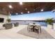 Outdoor patio with water views, seating and dining area at 188 Golden Gate Pt # 202, Sarasota, FL 34236