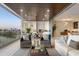 Spacious balcony with seating area and water views at 188 Golden Gate Pt # 202, Sarasota, FL 34236