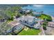 Aerial view showcasing home, pool, and dock at 2287 Bayshore Rd, Nokomis, FL 34275