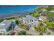 Aerial view of waterfront home with private dock at 2287 Bayshore Rd, Nokomis, FL 34275