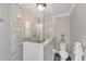 Updated bathroom featuring a walk-in shower with modern tile at 2287 Bayshore Rd, Nokomis, FL 34275
