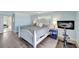 Bedroom with light blue walls and a ceiling fan at 2287 Bayshore Rd, Nokomis, FL 34275