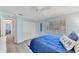 Guest bedroom with a queen bed and ample closet space at 2287 Bayshore Rd, Nokomis, FL 34275