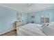 Bedroom with water views and a ceiling fan at 2287 Bayshore Rd, Nokomis, FL 34275