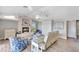 Relaxing living room with fireplace and water views at 2287 Bayshore Rd, Nokomis, FL 34275