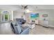 Open living room with comfortable seating and built in bar at 2287 Bayshore Rd, Nokomis, FL 34275