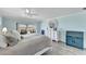 Main bedroom with water views and access to patio at 2287 Bayshore Rd, Nokomis, FL 34275