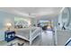 Main bedroom with water views and access to patio at 2287 Bayshore Rd, Nokomis, FL 34275