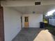 Covered carport with storage and access door at 4514 103Rd W St, Bradenton, FL 34210