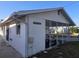 Side view of house and carport with golf cart at 4514 103Rd W St, Bradenton, FL 34210