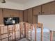 Damaged kitchen awaiting renovation. Microwave is present at 4514 103Rd W St, Bradenton, FL 34210