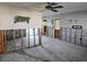 Open living area undergoing extensive renovation. Walls and floors gutted at 4514 103Rd W St, Bradenton, FL 34210