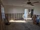Room is stripped for remodel; walls and floors are unfinished at 4514 103Rd W St, Bradenton, FL 34210