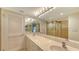 Double vanity bathroom with updated fixtures at 4825 Gulf Of Mexico Dr # 304, Longboat Key, FL 34228
