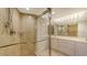 Bright bathroom with double vanity and walk-in shower at 4825 Gulf Of Mexico Dr # 304, Longboat Key, FL 34228