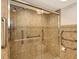 Walk-in shower with grab bars and tiled walls at 4825 Gulf Of Mexico Dr # 304, Longboat Key, FL 34228