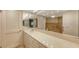 Clean bathroom with updated vanity and large mirror at 4825 Gulf Of Mexico Dr # 304, Longboat Key, FL 34228