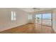 Bright bedroom with hardwood floors and ocean view at 4825 Gulf Of Mexico Dr # 304, Longboat Key, FL 34228