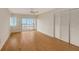 Spacious bedroom with hardwood floors and ocean view at 4825 Gulf Of Mexico Dr # 304, Longboat Key, FL 34228