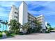 Side view of the building showcasing its architecture at 4825 Gulf Of Mexico Dr # 304, Longboat Key, FL 34228
