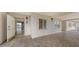 Building hallway with entrance to condo unit at 4825 Gulf Of Mexico Dr # 304, Longboat Key, FL 34228