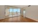 Living room with hardwood floors and ocean views at 4825 Gulf Of Mexico Dr # 304, Longboat Key, FL 34228
