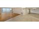 Living room with hardwood and tile floors, ocean view at 4825 Gulf Of Mexico Dr # 304, Longboat Key, FL 34228