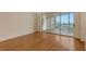 Living room with hardwood floors and ocean view at 4825 Gulf Of Mexico Dr # 304, Longboat Key, FL 34228