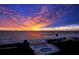 Spectacular sunset over the ocean with beach and pool view at 4825 Gulf Of Mexico Dr # 304, Longboat Key, FL 34228