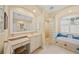 Elegant bathroom with a large vanity and glass shower at 518 Luminary Blvd, Osprey, FL 34229