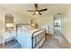 Bright bedroom with a comfortable bed and en-suite bathroom at 606 19Th W Ave, Palmetto, FL 34221