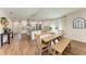 Modern kitchen features island, stainless steel appliances, and white shaker cabinets at 606 19Th W Ave, Palmetto, FL 34221