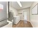 Convenient laundry room with washer, dryer, and exterior access at 606 19Th W Ave, Palmetto, FL 34221