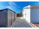 Side yard with storage shed and gated access at 606 19Th W Ave, Palmetto, FL 34221