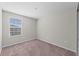 Bedroom with window and neutral wall colors at 6108 Willowside St, Palmetto, FL 34221