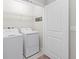 Laundry room with washer, dryer and shelving at 6108 Willowside St, Palmetto, FL 34221