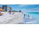 Beach with people relaxing and swimming at 932 Capri Isles Blvd # 216, Venice, FL 34292