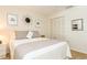 Cozy bedroom with double bed and closet at 932 Capri Isles Blvd # 216, Venice, FL 34292