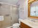 Clean bathroom with shower and wooden vanity at 1000 Dartmouth Dr, Bradenton, FL 34207